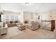 Comfortable living room with neutral decor, plush seating, and lots of natural light at 432 Belton St, Charlotte, NC 28209