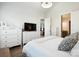Spacious main bedroom featuring hardwood floors, en-suite bathroom, and ample closet space at 432 Belton St, Charlotte, NC 28209