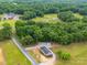 Aerial shot featuring the home and surrounding greenery at 4328 Camden Rd, Marshville, NC 28103