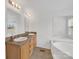 Bathroom with double sinks, large mirrors, tub and shower offers a relaxing and functional space at 4328 Camden Rd, Marshville, NC 28103
