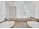 Clean bathroom featuring a dual sink vanity with ample counter space and well-lit mirrors at 4328 Camden Rd, Marshville, NC 28103
