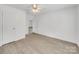 Bright bedroom with light wood floors, ceiling fan, and neutral walls provides a calm and relaxing space at 4328 Camden Rd, Marshville, NC 28103