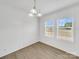 Dining room with ample natural light from double windows and wood-look floors makes a great space at 4328 Camden Rd, Marshville, NC 28103