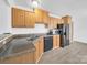 Kitchen with wood cabinets, laminate countertops, and stainless steel sink at 4328 Camden Rd, Marshville, NC 28103