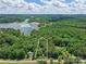 Beautiful aerial view of 4585 Sunrise Beach Rd property and the Lookout Shoals Public Boat Ramp in the distance at 4585 Sunrise Beach Rd, Catawba, NC 28609