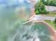 An aerial view of boat launch showcasing a peaceful lake perfect for boating and water activities at 4585 Sunrise Beach Rd, Catawba, NC 28609