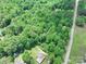 Aerial view of home and surrounding lot from a distance, conveying land size and natural setting at 4585 Sunrise Beach Rd, Catawba, NC 28609