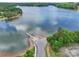 Aerial view of a lake and boat ramp with vehicles at 4585 Sunrise Beach Rd, Catawba, NC 28609
