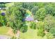 Aerial view of a private home with above ground pool and acreage at 4805 Nesbitt Rd, Monroe, NC 28112