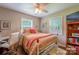 Relaxing bedroom with hardwood floors, a ceiling fan and comfortable furnishings at 4805 Nesbitt Rd, Monroe, NC 28112