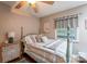 Cozy bedroom with natural light, a queen-size bed, and decorative accents at 4805 Nesbitt Rd, Monroe, NC 28112