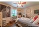 Spacious bedroom with hardwood floors, a zebra wall print, and lots of natural light at 4805 Nesbitt Rd, Monroe, NC 28112