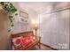 Charming entryway with wooden bench, soft lighting, and decorative wall accents for a cozy ambiance at 4805 Nesbitt Rd, Monroe, NC 28112
