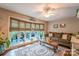 Bright living room featuring a large window, comfortable seating, and stylish area rug at 4805 Nesbitt Rd, Monroe, NC 28112