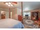 Comfortable main bedroom boasting hardwood floors, classic furnishings, and a peaceful ambiance at 4805 Nesbitt Rd, Monroe, NC 28112