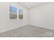 Bright bedroom with large window offering natural light and neutral color palette at 622 Old Salisbury Rd, Statesville, NC 28677