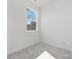 Well lit bedroom with a large window and plush neutral carpeting at 622 Old Salisbury Rd, Statesville, NC 28677