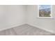 Cozy bedroom with a large window, plush carpeting, and fresh paint at 622 Old Salisbury Rd, Statesville, NC 28677