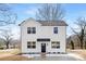 Charming two-story home with classic white siding and a welcoming front porch at 622 Old Salisbury Rd, Statesville, NC 28677