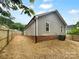 View of the home's backyard with privacy fence at 652 Wilson St, Kannapolis, NC 28083