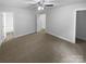 Spacious bedroom with neutral tones and carpet, multiple access doors and great natural light at 652 Wilson St, Kannapolis, NC 28083
