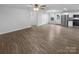 Open floor plan showcasing wood-look floors, white walls, and recessed lighting at 652 Wilson St, Kannapolis, NC 28083