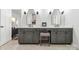 Modern bathroom featuring a double sink vanity with gray cabinets, stylish mirrors, and marble flooring at 754 Culp Ferguson Rd, Lancaster, SC 29720