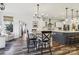 Open dining area with a modern table set, decorative chandelier, and plenty of natural light at 754 Culp Ferguson Rd, Lancaster, SC 29720