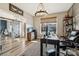 Inviting home office featuring a large window, modern lighting, and stylish wood-look flooring and a sliding barn door at 754 Culp Ferguson Rd, Lancaster, SC 29720