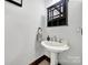 Charming powder room with unique sink and vanity at 8524 Quarters Ln, Mint Hill, NC 28227