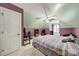 Bedroom with desk area, closet, and ceiling fan at 8524 Quarters Ln, Mint Hill, NC 28227