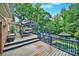 Spacious deck with a seating area, swimming pool, gazebo, and beautiful landscaping at 8524 Quarters Ln, Mint Hill, NC 28227
