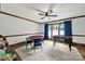 Spacious game room with foosball, poker table, and hardwood floors, ideal for entertainment at 8524 Quarters Ln, Mint Hill, NC 28227