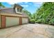 Spacious two-car garage with a wide driveway, offering ample parking and convenient access at 8524 Quarters Ln, Mint Hill, NC 28227