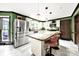 Open kitchen with large island, stainless appliances, granite counters and lots of cabinet space at 8524 Quarters Ln, Mint Hill, NC 28227