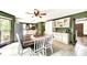 Open eat-in kitchen with green walls, white cabinets, and stainless-steel appliances at 8524 Quarters Ln, Mint Hill, NC 28227