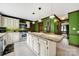Modern kitchen with stainless steel appliances, a large island, and pendant lighting at 8524 Quarters Ln, Mint Hill, NC 28227