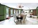 Spacious kitchen featuring stainless steel appliances, tile floors, and backyard views at 8524 Quarters Ln, Mint Hill, NC 28227