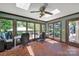 Bright sunroom with skylights, large windows offering a view, and space for a home office at 8524 Quarters Ln, Mint Hill, NC 28227