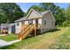 Charming single-story home with a wooden deck entrance and well-kept lawn at 953 Hardin Dr, Shelby, NC 28150