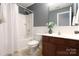 Bathroom with shower-tub combo at 9814 Fernspray Rd, Charlotte, NC 28215