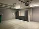 Attached garage with storage cabinets at 9814 Fernspray Rd, Charlotte, NC 28215