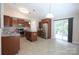 Modern kitchen with stainless steel appliances, a center island, and ample cabinet space at 9814 Fernspray Rd, Charlotte, NC 28215