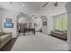 Spacious game room with hardwood floors, recessed lighting, and a foosball table at 10170 Enclave Cir, Concord, NC 28027