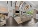 Bright living room with stone fireplace, vaulted ceilings, and a cozy seating area at 10170 Enclave Cir, Concord, NC 28027