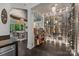 Climate controlled wine cellar with glass enclosure and custom shelving at 10170 Enclave Cir, Concord, NC 28027