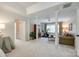 Finished basement area featuring support columns, neutral carpet, and ample space for recreation at 10327 Oak Pond Cir, Charlotte, NC 28277
