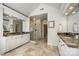 Modern bathroom showcasing marble countertops, a glass-enclosed shower, and recessed lighting at 10327 Oak Pond Cir, Charlotte, NC 28277