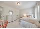 Serene bedroom with plush carpeting, soft natural light, and neutral tones, creating a comfortable and relaxing retreat at 10327 Oak Pond Cir, Charlotte, NC 28277