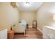 Small bedroom with hardwood floors, a single bed, and simple decor for a cozy atmosphere at 10327 Oak Pond Cir, Charlotte, NC 28277